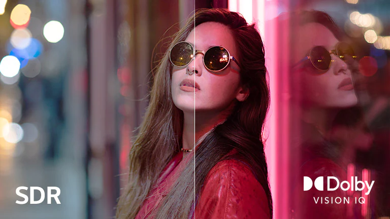 Güneş gözlüğü takan bir kadının sahnesi görsel karşılaştırma için ikiye bölünmüştür. Görselde, sol altta SDR metni ve sağ altta Dolby Vision IQ logosu var.