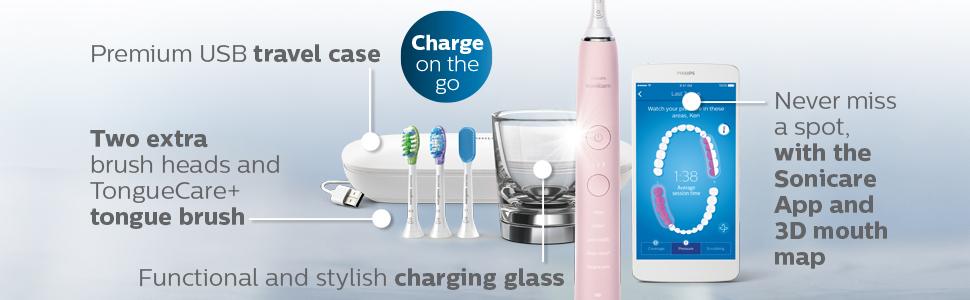 3 fırça başlığı, şarj camı, telefondaki uygulama, seyahat şarj kutusu ve diş fırçası sapı gösteriliyor