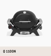 Dairesel tasarımlı ve siyah kaplamalı kompakt taşınabilir elektrikli ızgara. Metin şu şekildedir: Q-1100N