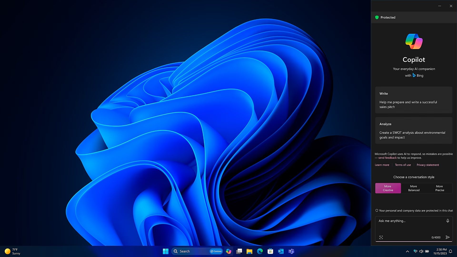 Laptop homepage with Microsoft Windows 11 blue logo as background and search tool opened.