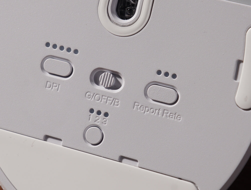 DPI-and-report-button-of-the-M5-mouse.jpg__PID:bfc49caf-8652-40cb-9a41-4605c0e5c6f8