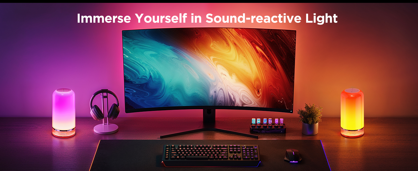 a computer monitor with a colorful background and a keyboard.