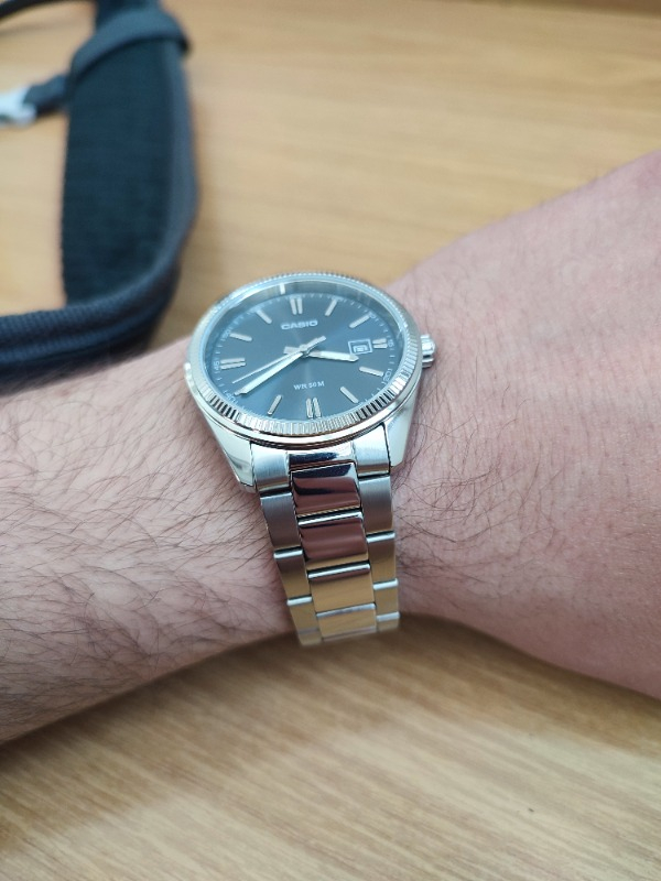 Casio MTP-1302D-1A1VDF Erkek Kol Saati Çelik Malzeme Suya Dayanıklı 50 m Siyah Kadran