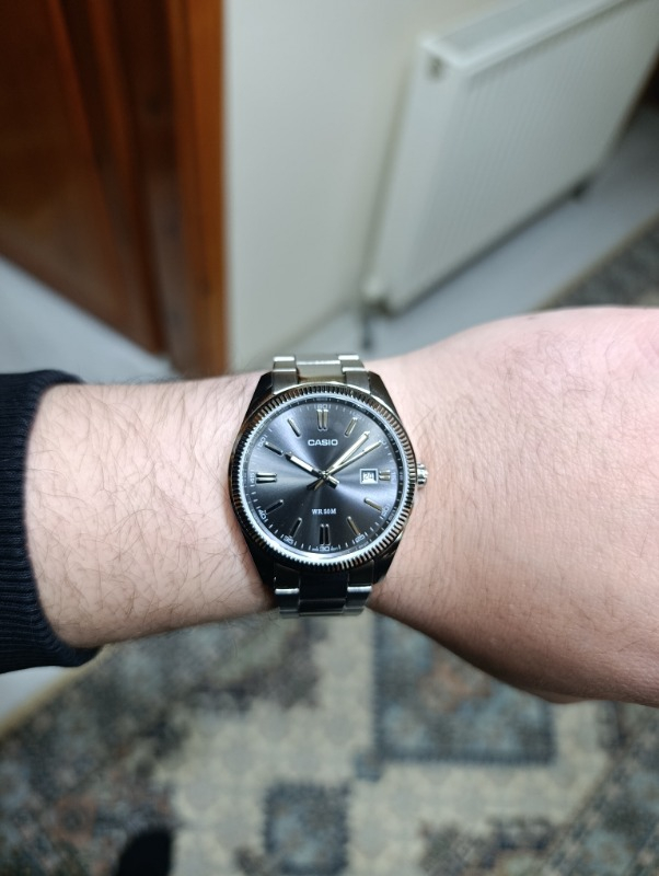 Casio MTP-1302D-1A1VDF Erkek Kol Saati Çelik Malzeme Suya Dayanıklı 50 m Siyah Kadran
