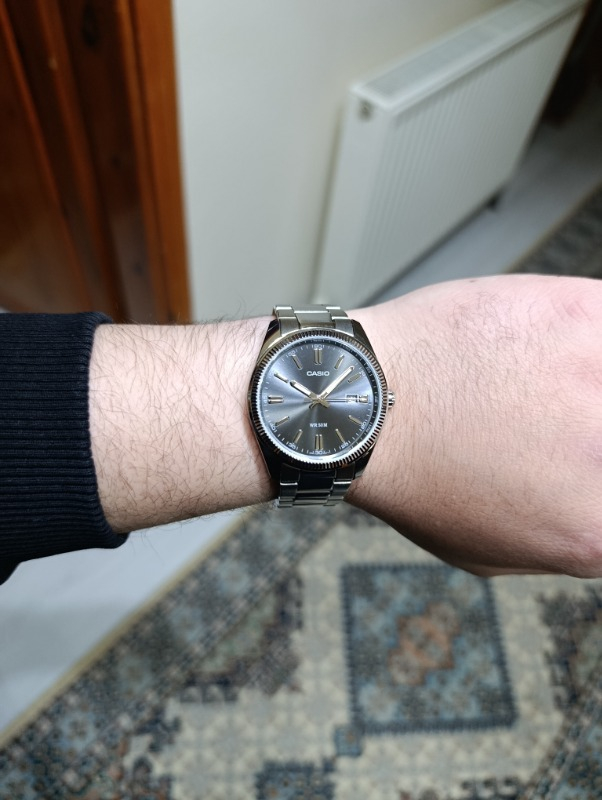 Casio MTP-1302D-1A1VDF Erkek Kol Saati Çelik Malzeme Suya Dayanıklı 50 m Siyah Kadran